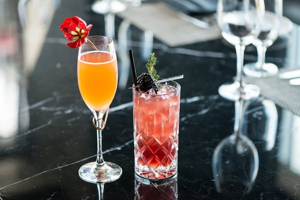 Double Eagle Steakhouse cocktails Pamplemousse Spritz (left) and Sapphire Bramble (right). Photo credit- Mia Yakel.