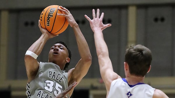 Pace Academy's Matthew Cleveland shoots over a Jefferson defender in the Class AAA boys state basketball championship Thursday, March 5, 2020, in Macon.