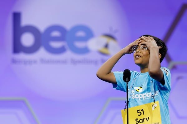 Sarv Dharavane reacts after successfully spelling his word in the quarterfinals of the Scripps National Spelling Bee on May 29, 2024, in National Harbor, Md. (Anna Moneymaker/Getty Images)