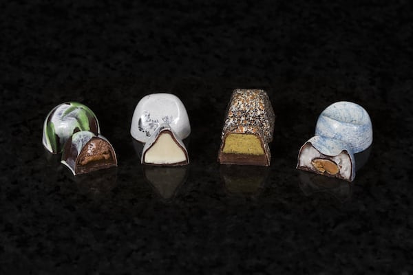 Each Jardi Chocolates bonbon is hand-painted. This collection of treats showcases layered fillings inside speckled, swirled and marbled chocolate shells. CONTRIBUTED BY RICHARDSON MEDIA HOUSE