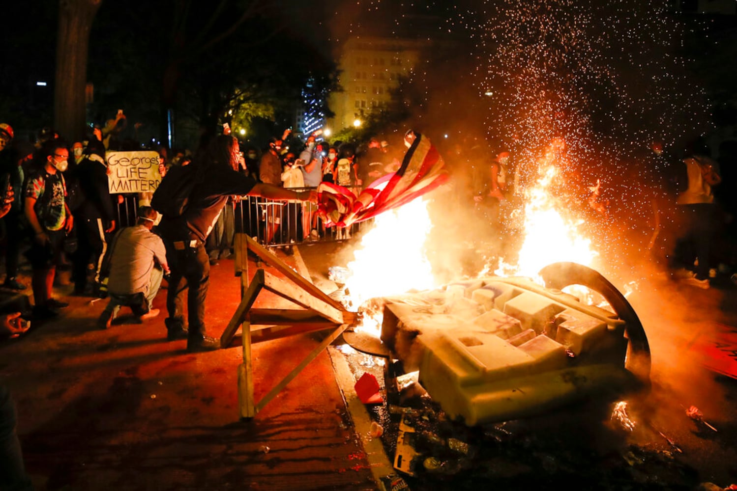 PHOTOS: U.S. cities face protests, fallout Sunday after George Floyd’s death