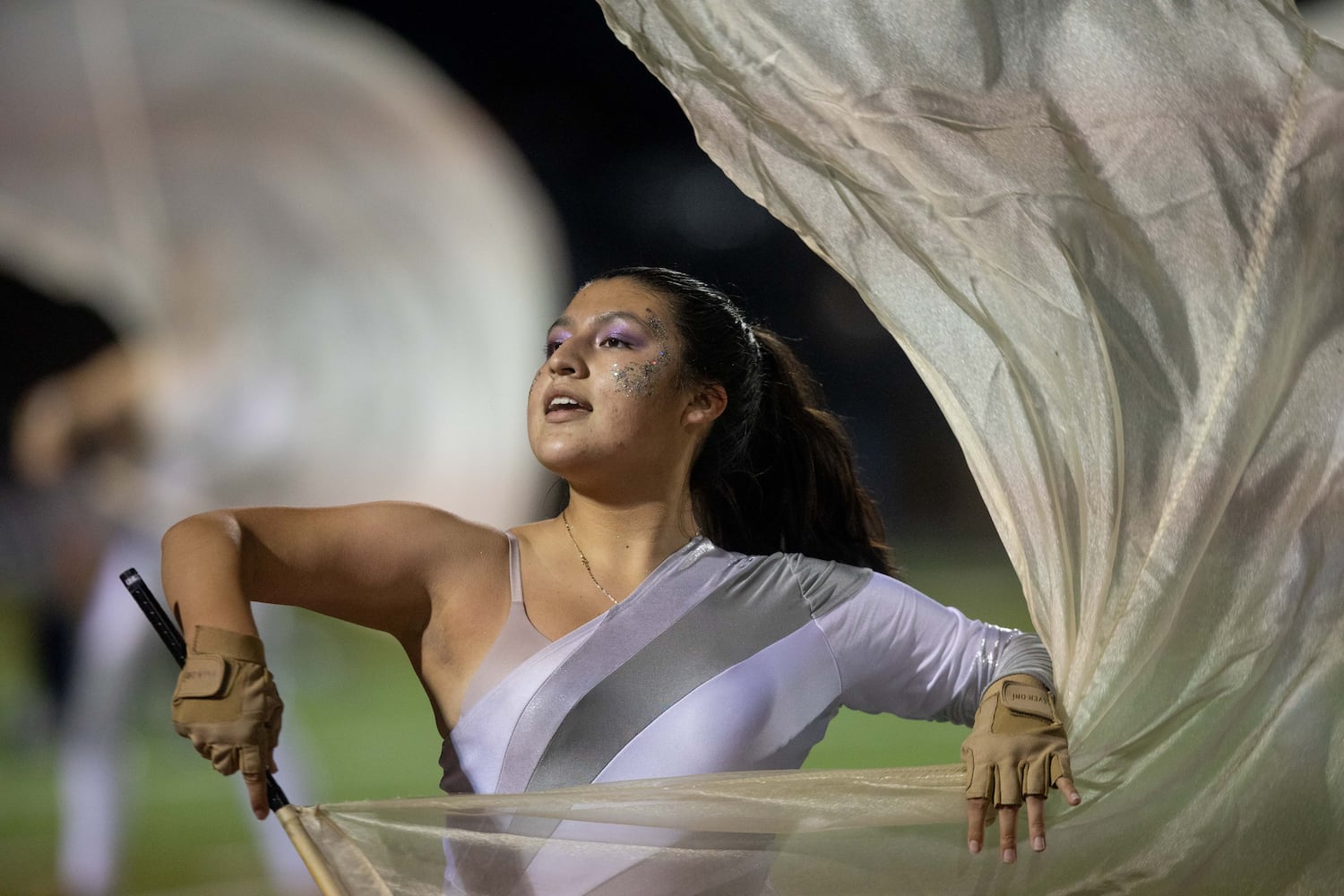 A Norcross majorette performs at a GHSA high school football game between Archer High School and Norcross High School in Lawrenceville, GA., on Friday, November 5, 2021. (Photo/Jenn Finch)