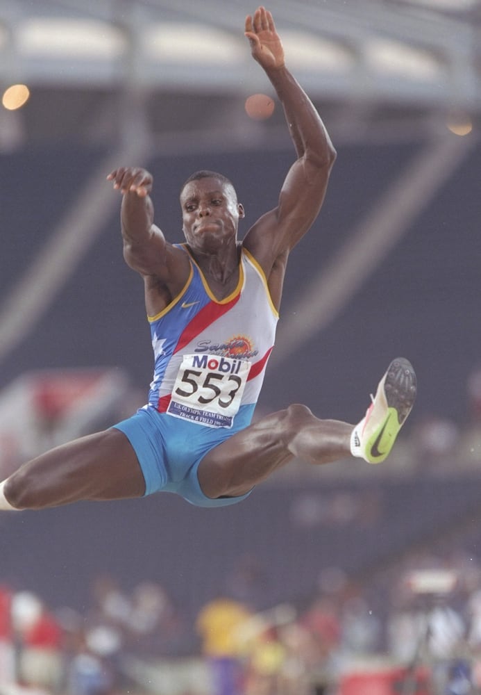 Carl Lewis wins the long jump