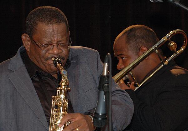 Dwight Andrews (l) blends his love of music and ministry as an Emory professor and head of the First Congregational Church. He's also a performer. Over the holidays, he teamed up with trombonist Emmett Goods for a concert at the Rialto Center.