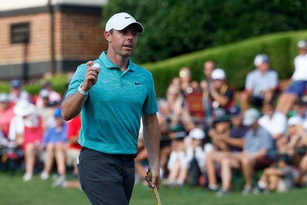 Rory McIlroy reacts after his round on the eighteenth green during the second round of the Tour Championship at East Lake Golf Club, Friday, August 26, 2022, in Atlanta. (Jason Getz / Jason.Getz@ajc.com)