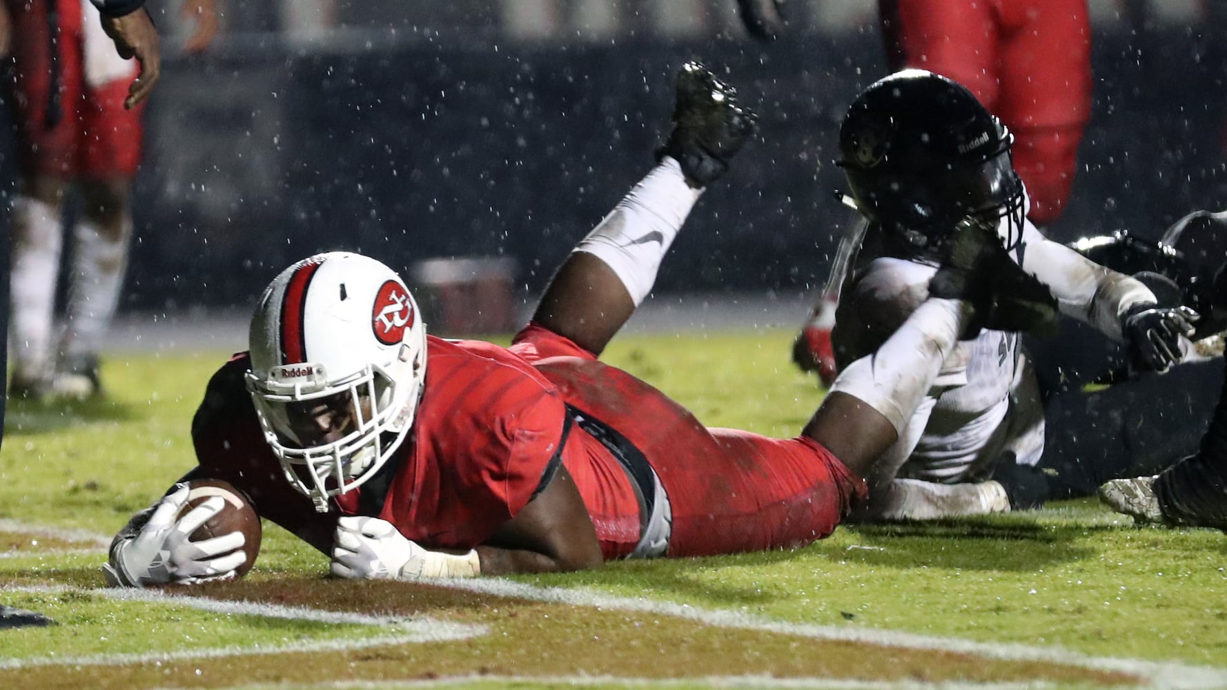 Photos: First round of high school football state playoffs