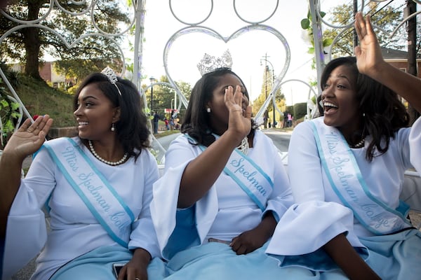 Miss Spelman Janna LeAnn Perry (C) and her two Attendants Zaire Bailey (R) and Haleigh Renèe Hoskins (L) ride in a carriage during the combined homecoming parade of Clark Atlanta University, Morehouse College and Spelman College in Atlanta GA October 21, 2017. STEVE SCHAEFER / SPECIAL TO THE AJC