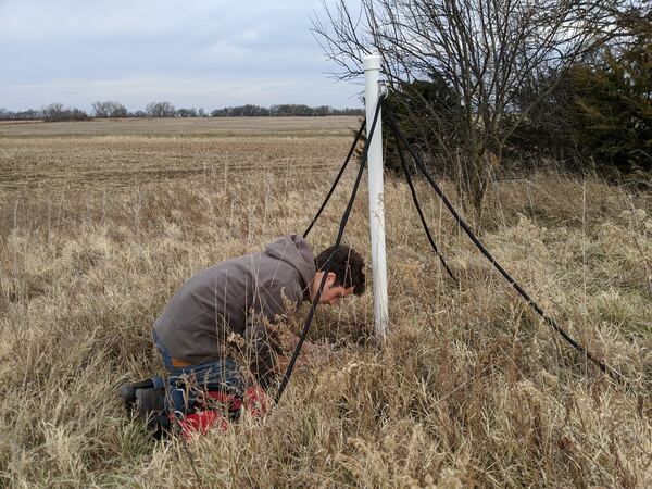 Edward Slevin, a former graduate student at Georgia Tech, installs on of Tech's low frequency radio antennas. Georgia Tech LF Radio Lab