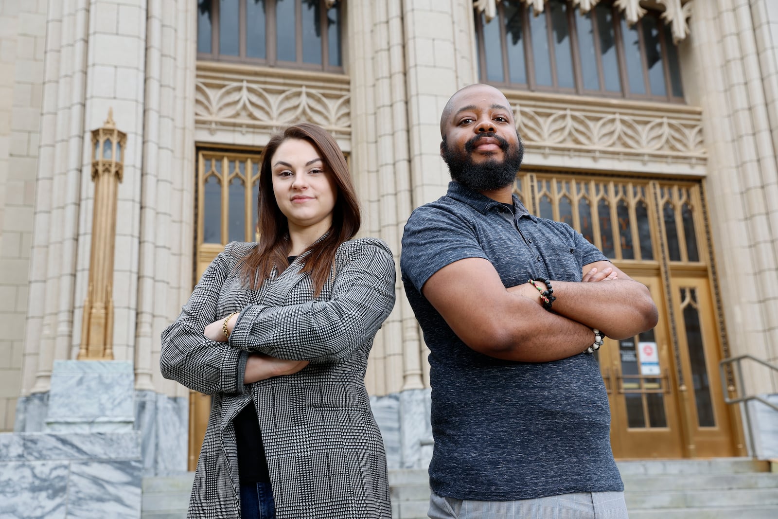 Captured in front of the emblematic Atlanta City Hall, Atlanta Journal-Constitution's City Hall reporters Wilborn P. Nobles III (L) and Riley Bunch proudly showcase their commitment to bringing the latest and most accurate news to their readers. Miguel Martinez /miguel.martinezjimenez@ajc.com