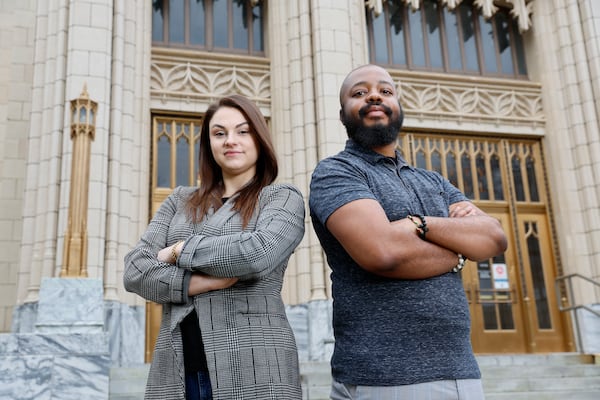 Captured in front of the emblematic Atlanta City Hall, Atlanta Journal-Constitution's City Hall reporters Wilborn P. Nobles III (L) and Riley Bunch proudly showcase their commitment to bringing the latest and most accurate news to their readers.
Miguel Martinez /miguel.martinezjimenez@ajc.com