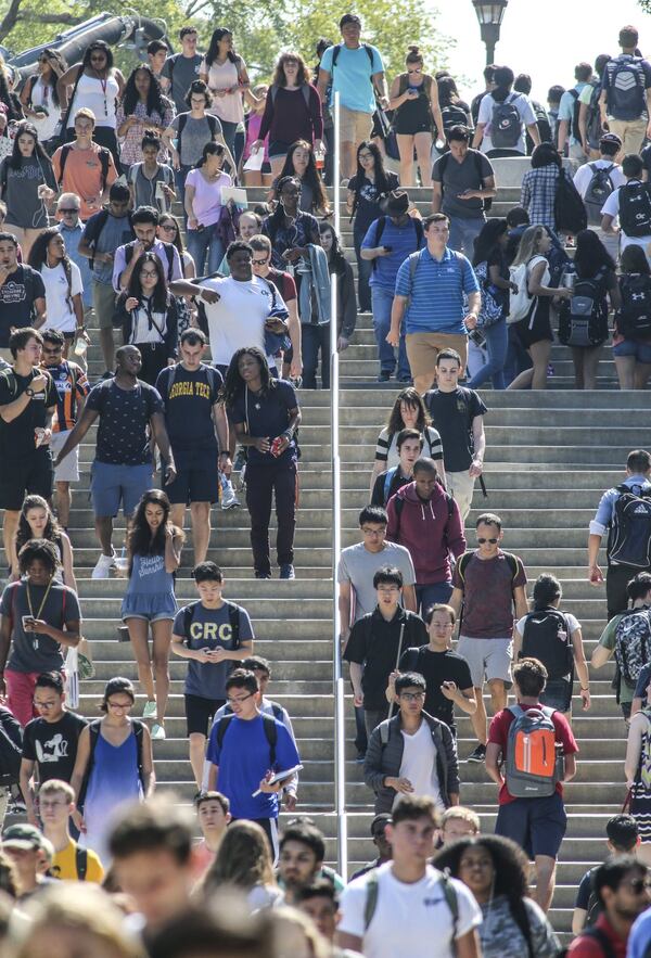 Georgia Tech students walk to and from class on the first day of the semester in this AJC file photo.