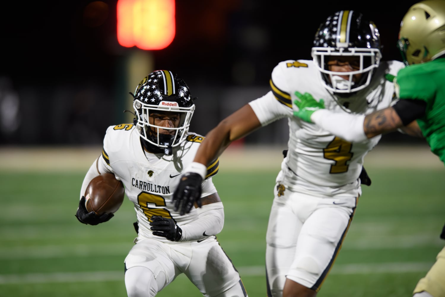 Carrollton’s Peyton Zachary runs the ball. (Jamie Spaar for the Atlanta Journal Constitution)