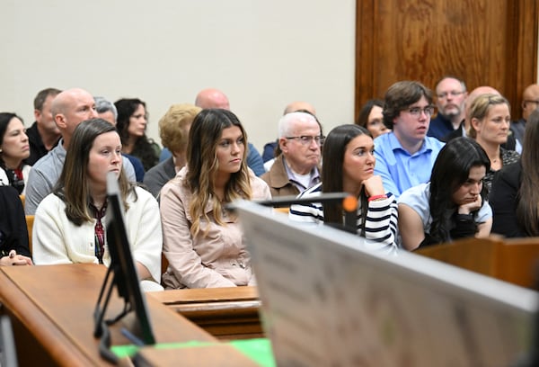 Family members and friends of Laken Riley listen to closing arguments before Superior Court Judge H. Patrick Haggard during a trial of Jose Ibarra at Athens-Clarke County Superior Court, Wednesday, Nov. 20, 2024, in Athens, Ga. (Hyosub Shin/Atlanta Journal-Constitution via AP, Pool)