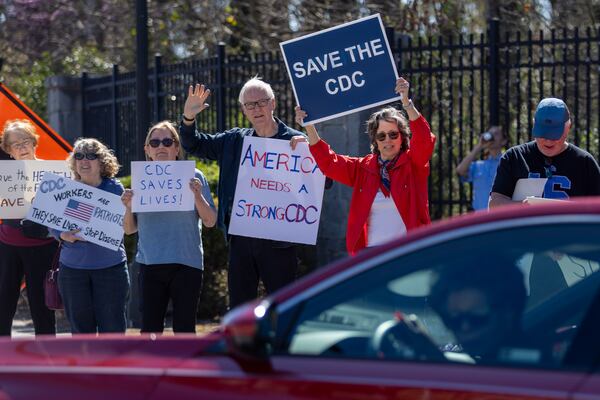 Protestors demonstrate in front of the CDC Chamblee Campus on Tuesday. 