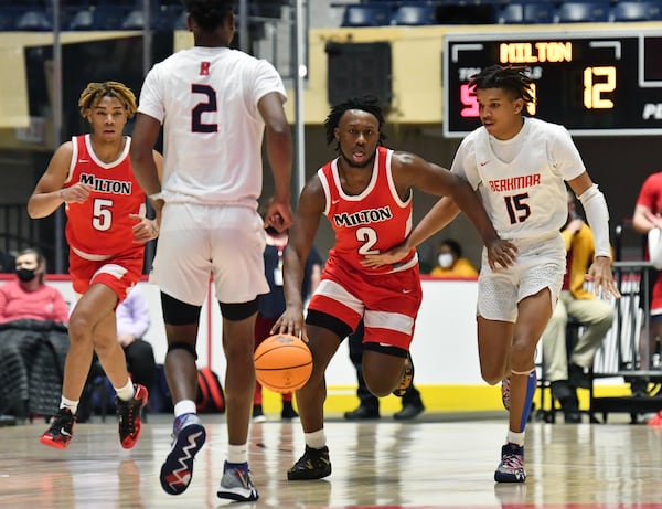 Milton's Bruce Thornton (2) brings the ball upcourt during the Class 7A championship game Saturday, March 13, 2021, in Macon. (Hyosub Shin / Hyosub.Shin@ajc.com)