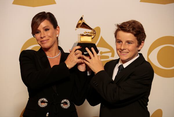 Melissa Rivers and son pick up the award for her mother, Joan Rivers, backstage at the 57th Annual Grammy Awards at Staples Center in Los Angeles on Sunday, Feb. 8, 2015. (Lawrence K. Ho/Los Angeles Times/TNS) Joan Rivers would have been proud of daughter Melissa and grandson Cooper. Photo: Getty Images.