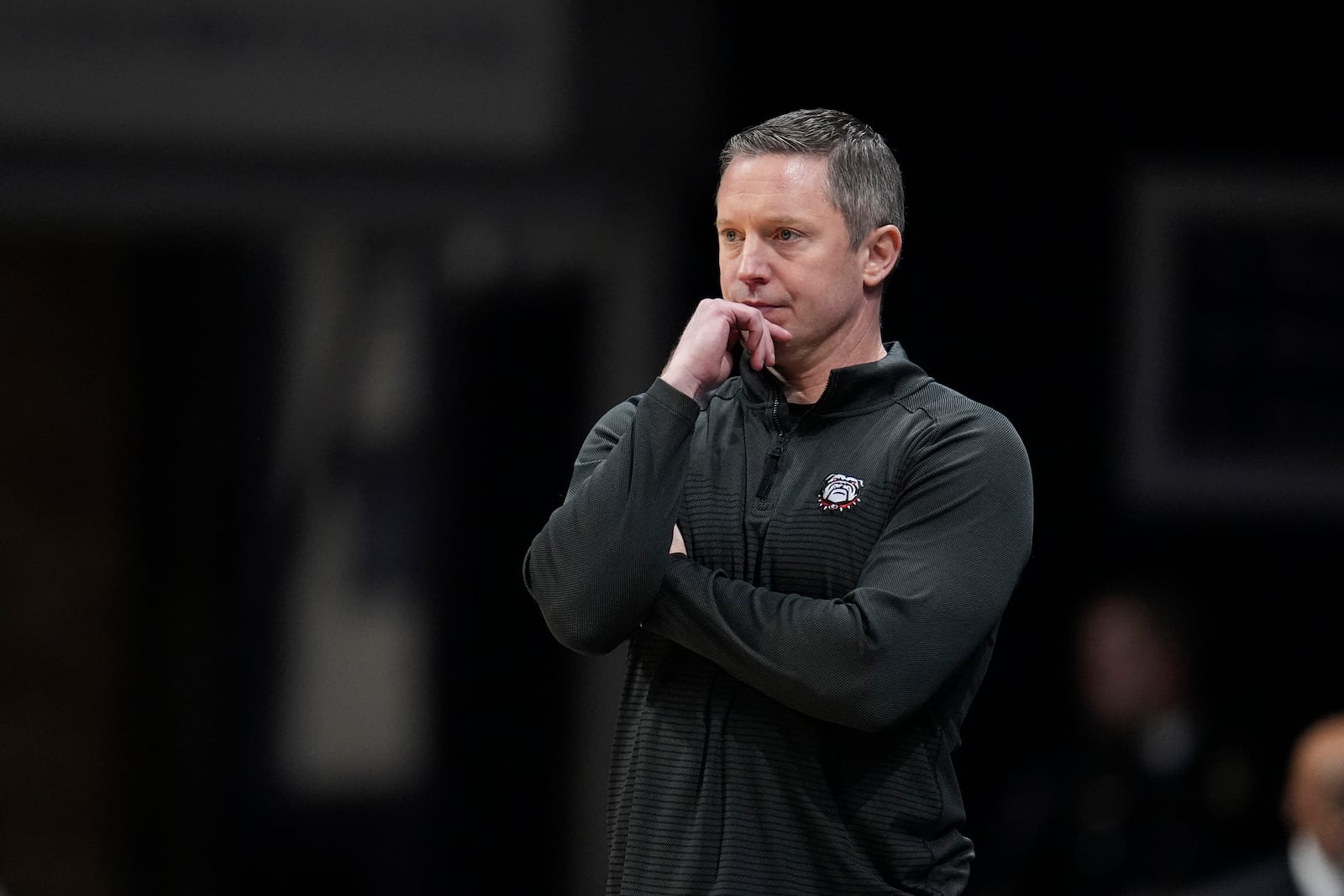 FILE - Georgia head coach Mike White watches from the bench in the first half of an NCAA college basketball game against Seton Hall in the semifinals of the NIT, Tuesday, April 2, 2024, in Indianapolis. (AP Photo/Michael Conroy, File)