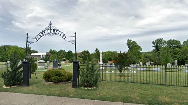 Pictured in a 2018 Street View image is Perry Cemetery in Carrollton, Texas. A caretaker at the cemetery spotted an out-of-place flower pot on March 11 and, when he started to empty the dirt from the pot, found the remains of a newborn girl.