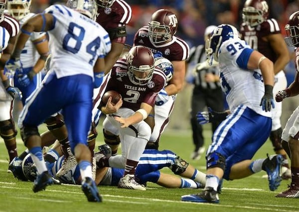 Johnny Football: Three-star prospect, All-American player. (Brant Sanderlin/AJC)