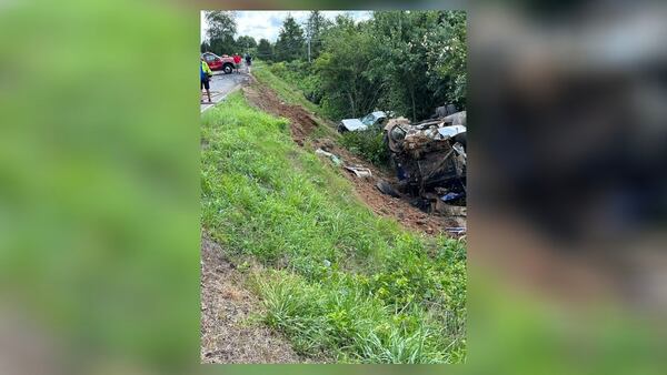 A dump truck and two other vehicles tumbled down an embankment Friday in Towns County after the dump truck blew a tire and lost control. The Dalton family's SUV was hit by the truck head-on, authorities said.