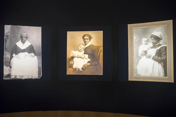 Photos depicting the Mammy archetype from the 19th and 20th centuries are displayed inside the ‘Framing Shadows’ exhibit at the Robert W. Woodruff Library on the Emory University campus.