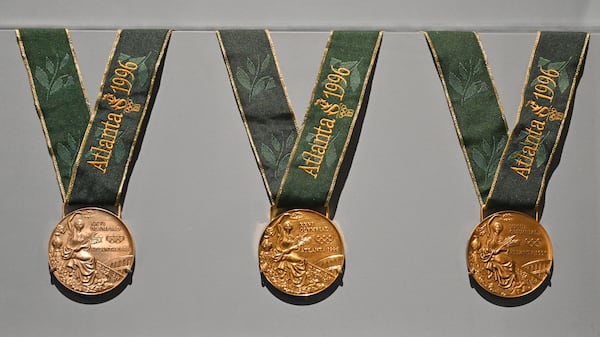 Silver, gold and bronze medals from the 1996 Atlanta Olympic Medals are displayed in an exhibit at the Atlanta History Center on Tuesday, July 20, 2021. The history center has an ongoing exhibit about the 1996 Olympic Games in Atlanta. (Hyosub Shin / Hyosub.Shin@ajc.com)