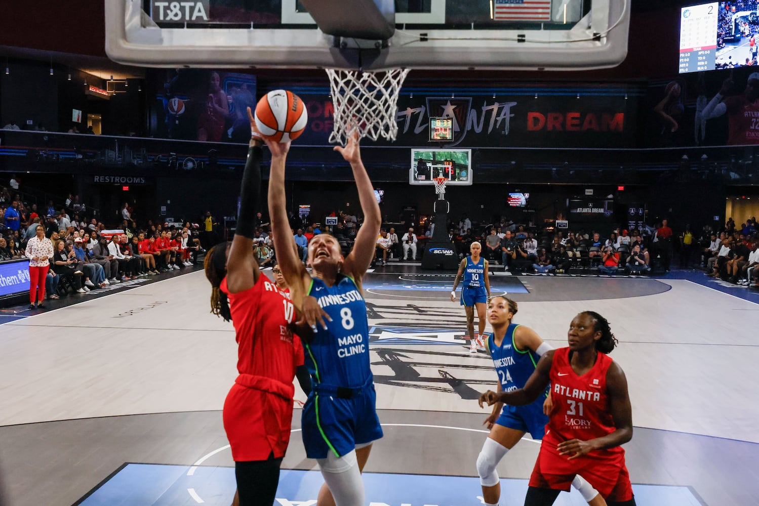 Minnesota Lynx forward Alanna Smith (8) fights for the ball against Atlanta Dream guard Rhyne Howard (10) in the second half at Gateway Center Arena, Sunday, May 26, 2024, in Atlanta. (Miguel Martinez / AJC)