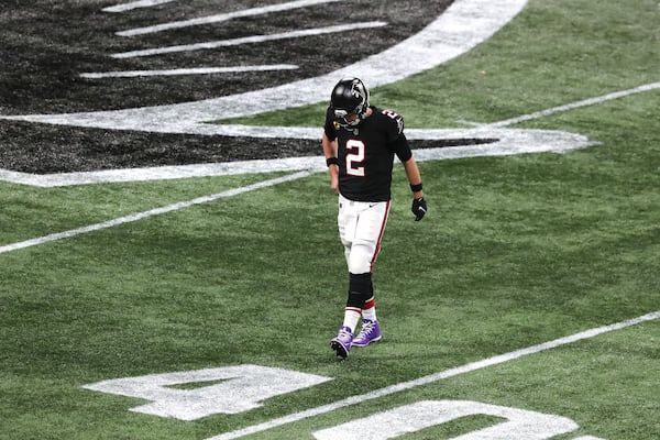 Falcons Matt Ryan returns to the sidelines after a failed 4th-down attempt to Julio Jones during the fourth quarter against the New Orleans Saints Sunday, Dec. 6, 2020, at Mercedes-Benz Stadium in Atlanta. The Saints won 21-16. (Curtis Compton / Curtis.Compton@ajc.com)