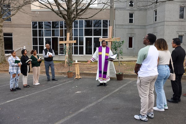 Father Urey Patrick Mark leads a prayer vigil for Jatonne Sterling at the parking lot of the Lyke House, the Catholic center and ministry at Atlanta University Center, on Wednesday, March 1, 2023, in Atlanta. Jatonne Sterling, a Clark Atlanta student, was fatally shot in the center’s parking lot, on Beckwith Street the day before, Tuesday afternoon, Feb. 28, 2023. Jason Getz / Jason.Getz@ajc.com)
