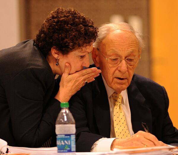 Linda Lanier Fortson whispers in the ear of her husband Warren C. Fortson during an Atlanta Public Schools tribunal in 2012. The Fortsons defended many public school teachers during the Atlanta Public Schools cheating hearings and at trial. JOHNNY CRAWFORD / JCRAWFORD@AJC.COM