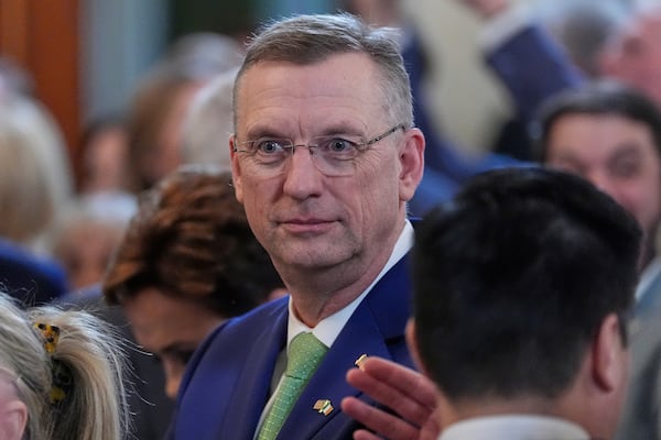 Veterans Affairs Secretary Doug Collins arrives before Ireland's Prime Minister Michael Martin and President Donald Trump speak during an event in the East Room of the White House in Washington, Wednesday, March 12, 2025. (AP Photo/Alex Brandon)