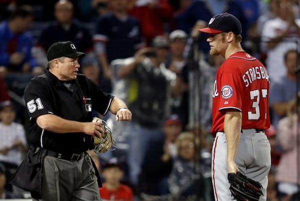 Stephen Strasburg gets a second-inning thumb. (AP photo)