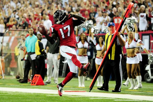 ATLANTA, GA - SEPTEMBER 18: Wide receiver Devin Hester #17 of the Atlanta Falcons returns a punt for a touchdown against the Tampa Bay Buccaneers during a game at the Georgia Dome on September 18, 2014 in Atlanta, Georgia. (Photo by Scott Cunningham/Getty Images)