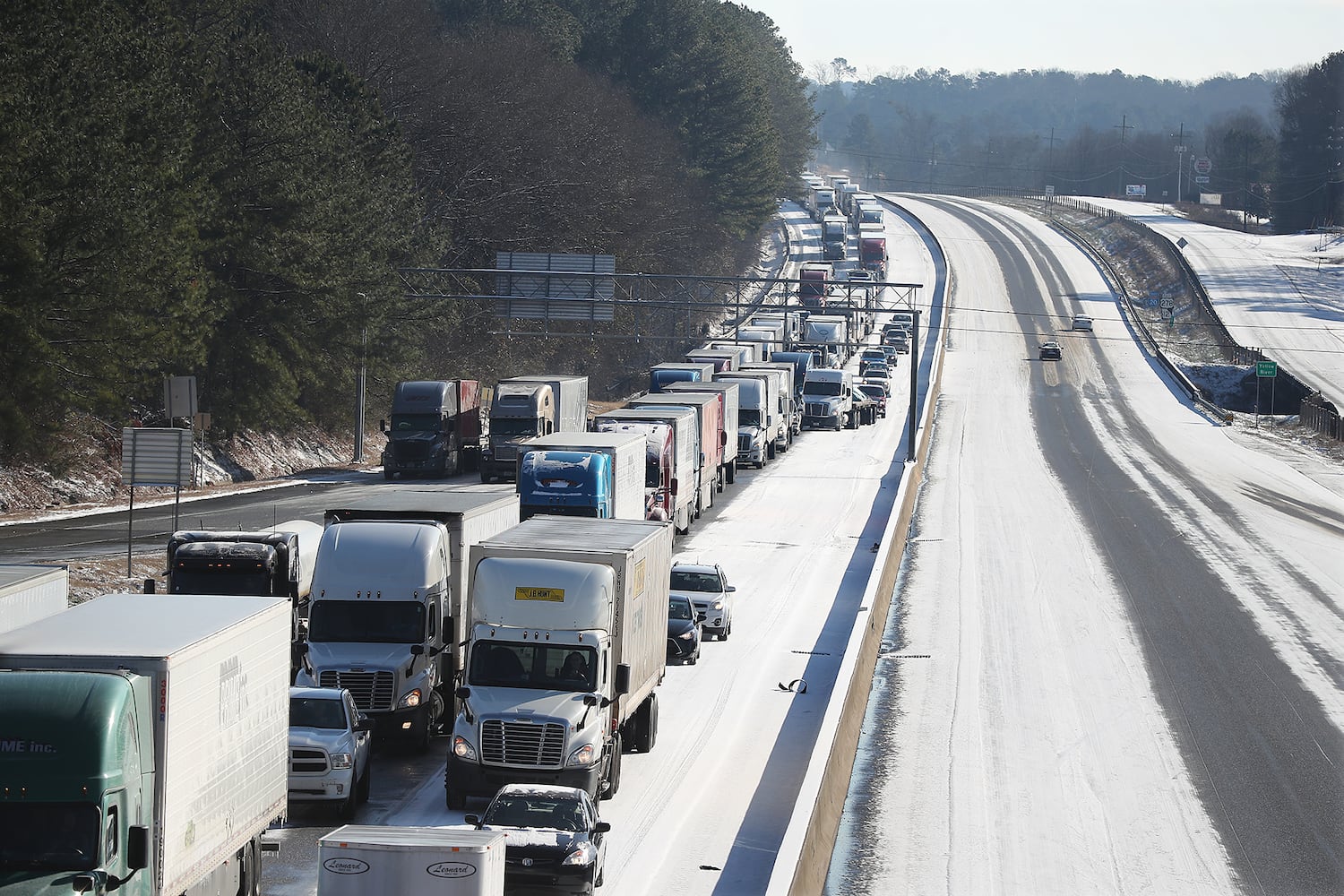 Photos: Frigid cold and snow move in to metro Atlanta