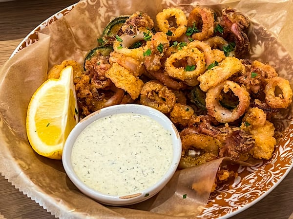 The calamari at Raik Mediterranean featured perfectly tender squid with crisp, thin breading. (Henri Hollis/henri.hollis@ajc.com)