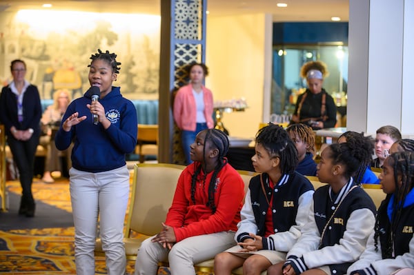 A guest from Ron Clark Academy poses a question to the actors during a panel discussion with the cast of Disney on Broadway’s “Aladdin” at the Fox Theatre in Atlanta, GA on Thursday, January 11, 2024. (Jamie Spaar for the Atlanta Journal Constitution)