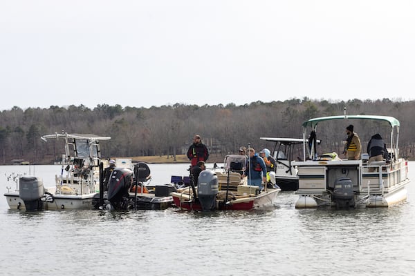 Volunteer searchers are seen at Lake Oconee in Eatonton on Thursday, February 13, 2025. The Putnam County sheriff is investigating and volunteers are searching after Spelman College instructor Joycelyn Nicole Wilson and Atlanta private school coach Gary Jones went missing on Lake Oconee over the weekend. The body of Wilson was found Sunday and Jones has not been found.(Arvin Temkar / AJC)