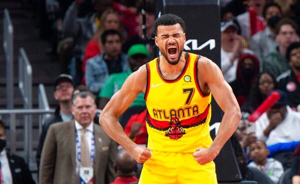 Atlanta Hawks guard Timothe Luwawu-Cabarrot (7) reacts after scoring during the second half of an NBA basketball game against the Brooklyn Nets, Saturday, April 2, 2022, in Atlanta. (AP Photo/Hakim Wright Sr.)