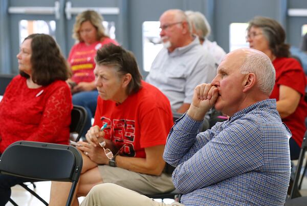 050222 Monroe: Wayne Haynie (right), chief engineer Newton County Water & Sewerage Authority, and local residents listen to presentations by the Site Design and Environmental Committee on the planned $5 billion Rivian electric vehicle plant during the second public meeting on Monday, May 2, 2022, in Monroe.    “Curtis Compton / Curtis.Compton@ajc.com”