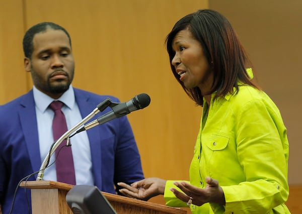 Vonda Benton, the mother of Nicholas Benton, addresses the judge during the sentencing hearing for Nicholas, convicted of murder in Fulton County Superior Court, as defense attorney Gerald Griggs stands to the left. (BOB ANDRES  /BANDRES@AJC.COM)