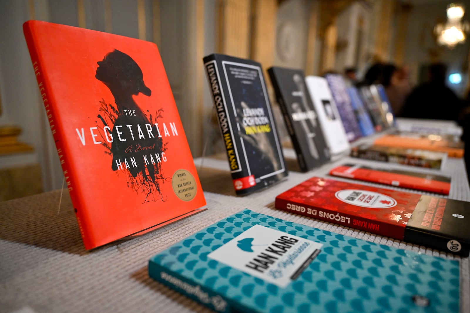 Books by the South Korean writer Han Kang displayed at the Swedish Academy in Stockholm, Thursday, Oct. 10, 2024. Kang has been awarded the Nobel Prize for Literature. (Jessica Gow/TT News Agency via AP)