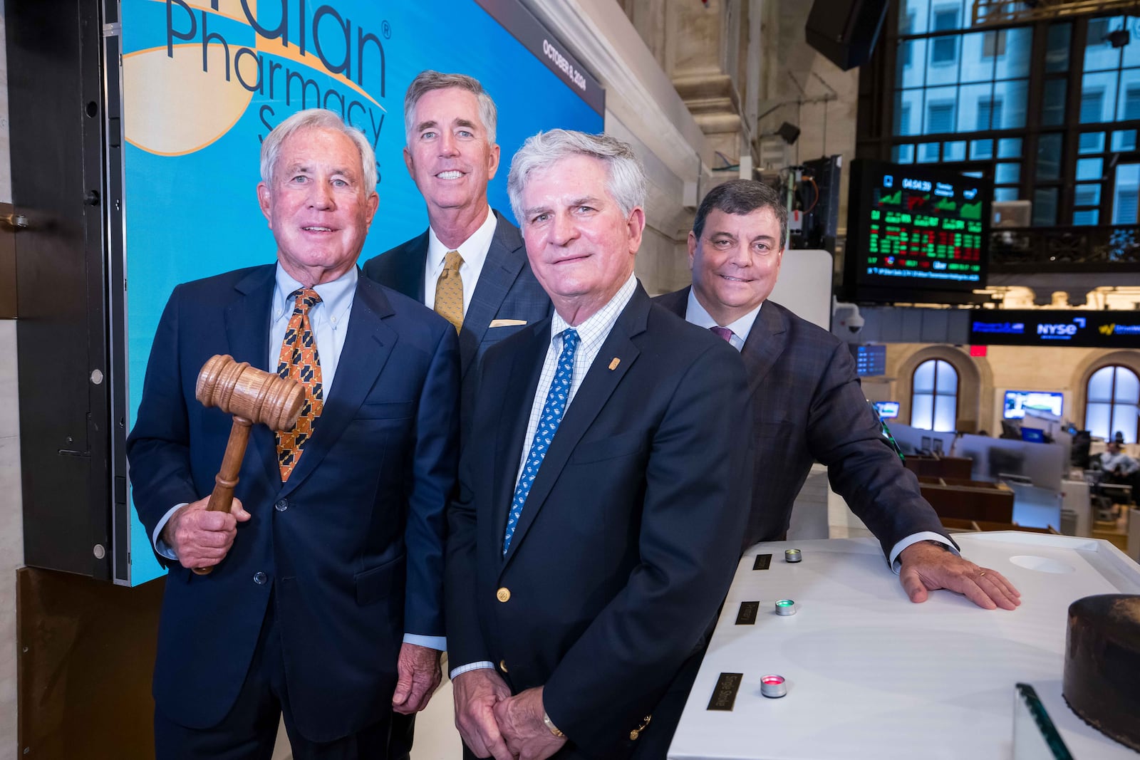 Guardian Pharmacy Services Chairman William Bindley (left) with and co-founders Kendall Forbes (executive vice president of sales and operations), Fred Burke (president and CEO) and David Morris (chief financial officer) got to ring the closing bell Tuesday at the New York Stock Exchange.
