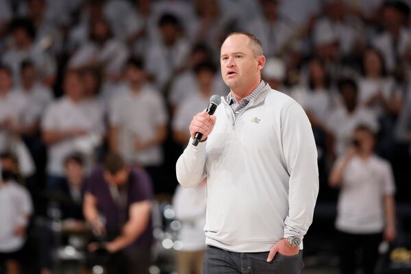 Georgia Tech Yellow Jackets football head coach Brent Key talks to fans during halftime of Tech’s game against the Georgia Bulldogs at McCamish Pavilion, Tuesday, December 6, 2022, in Atlanta. (Jason Getz / Jason.Getz@ajc.com)