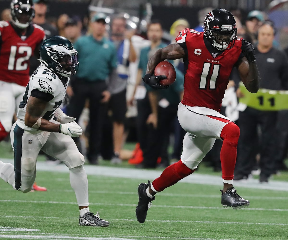 Photos: Falcons outlast Eagles for first win