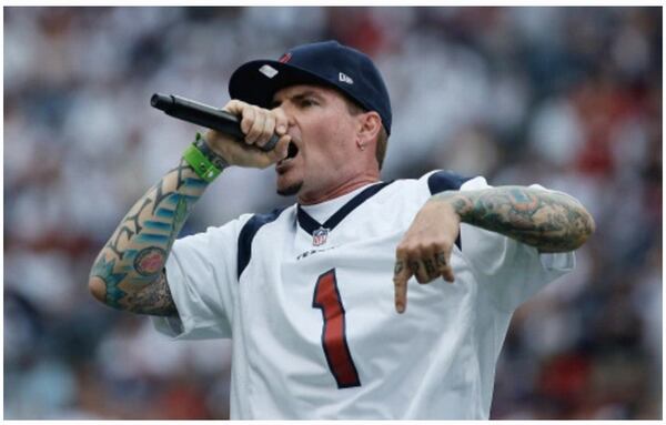 Rapper Vanilla Ice performs for fans at a game between the Houston Texans and the Tennessee Titans at Reliant Stadium on Sept. 15, 2013 in Houston, Tex. Photo by Scott Halleran/Getty Images