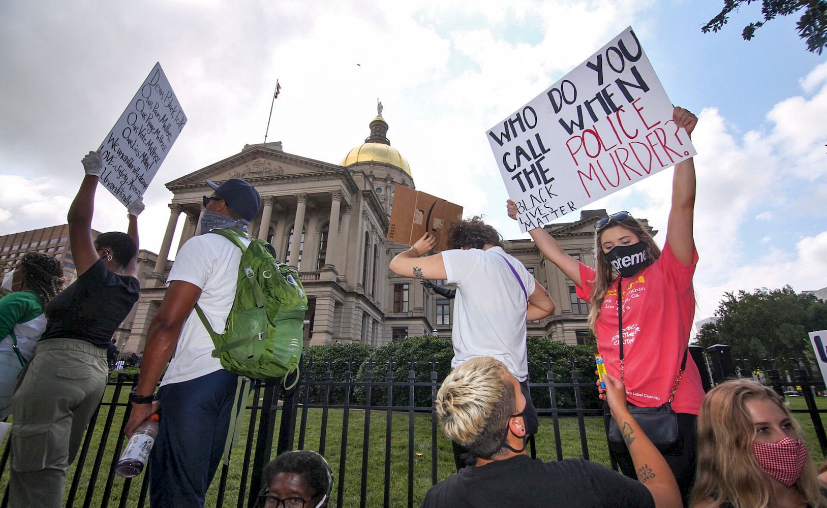 PHOTOS: Thousands march at Georgia Capitol as lawmakers return