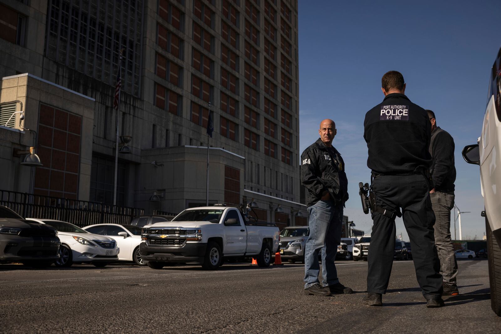 Federal enforcement officers stand outside the Metropolitan Detention Center, where Sean “Diddy” Combs is incarcerated, during an interagency operation, Monday, Oct. 28, 2024, in the Brooklyn Borough of New York. (AP Photo/Yuki Iwamura)