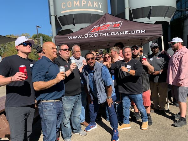 92.9/The Game gathered its sports hosts for a group photo during the 10th anniversary party October 22, 2022 at New Realm Brewery in Atlanta. RODNEY HO/rho@ajc.com