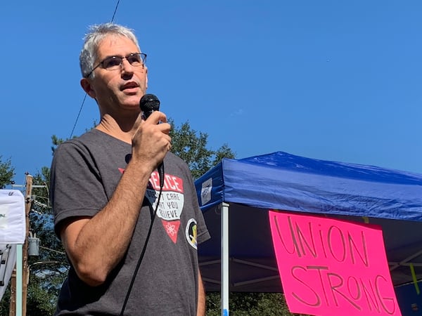 Dave Chameides, a veteran camera operator working currently on Netflix's "Ozark," said the crew union is seeking reasonable work hours and rest periods as well as regular meal breaks. He spoke at a strike solidarity gathering in Atlanta Sept. 25, 2021. RODNEY HO/rho@ajc.com