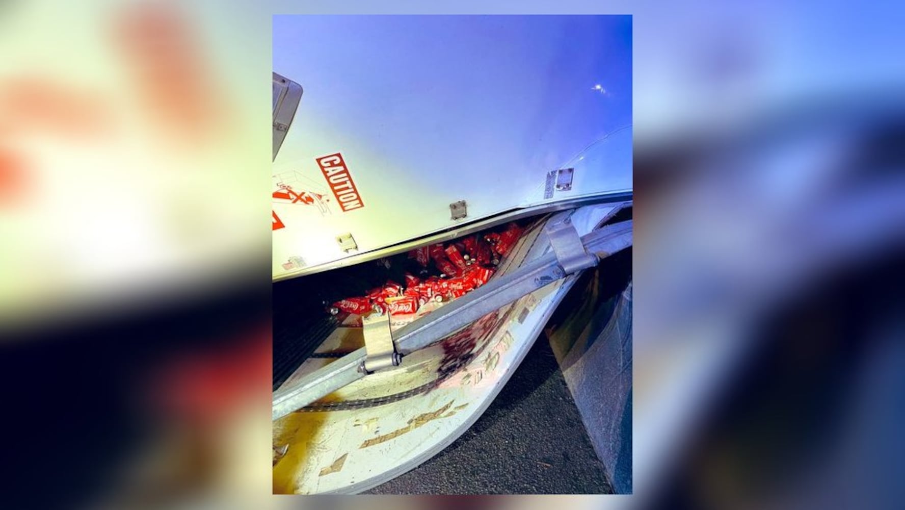 Coca-Cola delivery truck overturns July 28 2020